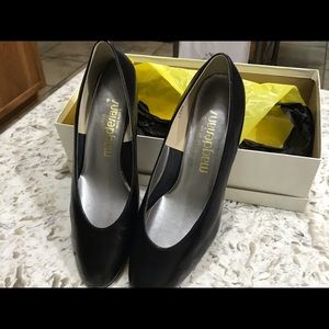 Size 6 Black short heel.